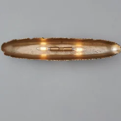 Oumaumau Sconce