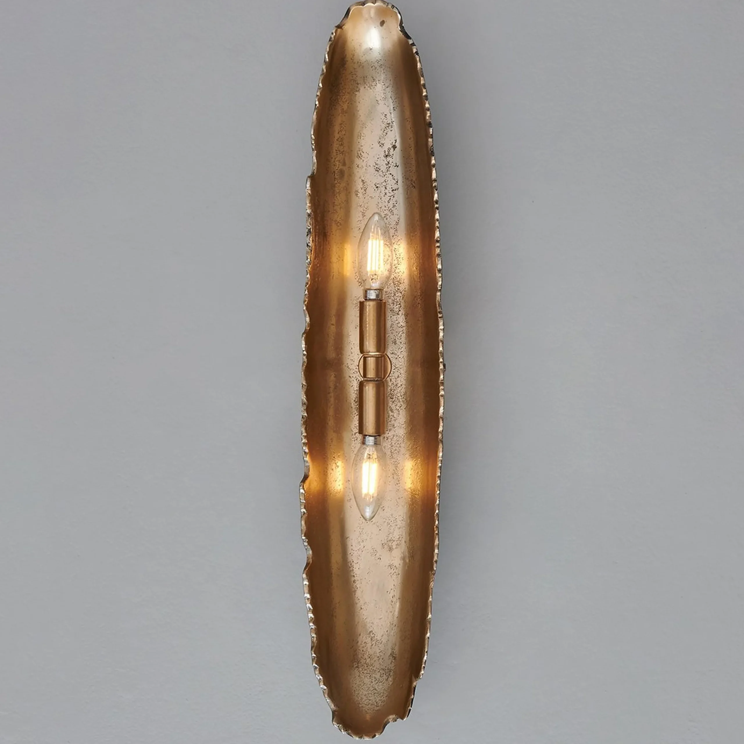 Oumaumau Sconce